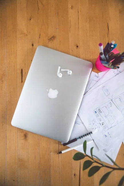 Flat lay showing branding materials and design concepts for creative strategy discussions.